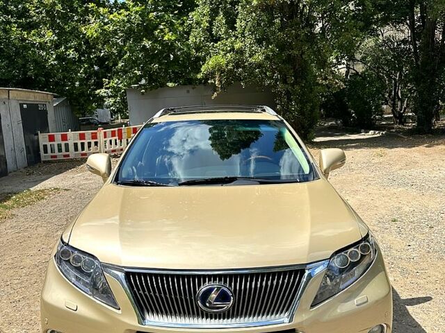 Желтый Лексус РХ, объемом двигателя 3.5 л и пробегом 290 тыс. км за 15600 $, фото 2 на Automoto.ua