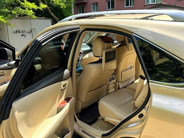 Желтый Лексус РХ, объемом двигателя 3.5 л и пробегом 290 тыс. км за 15600 $, фото 4 на Automoto.ua