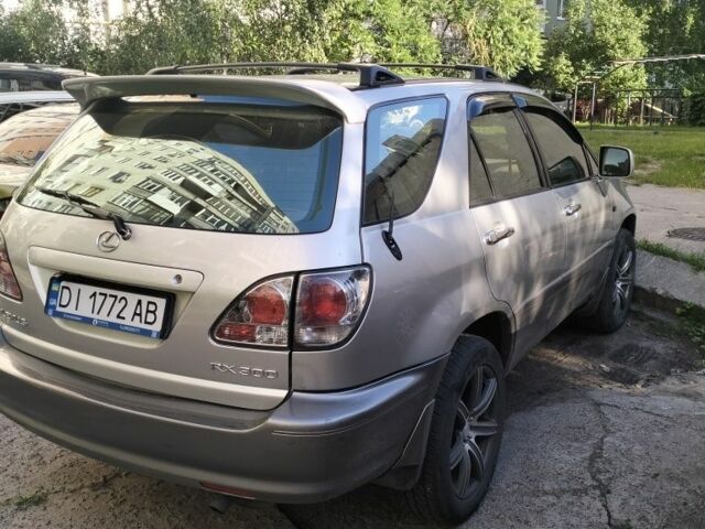 Серый Лексус РХ, объемом двигателя 3 л и пробегом 335 тыс. км за 6800 $, фото 1 на Automoto.ua