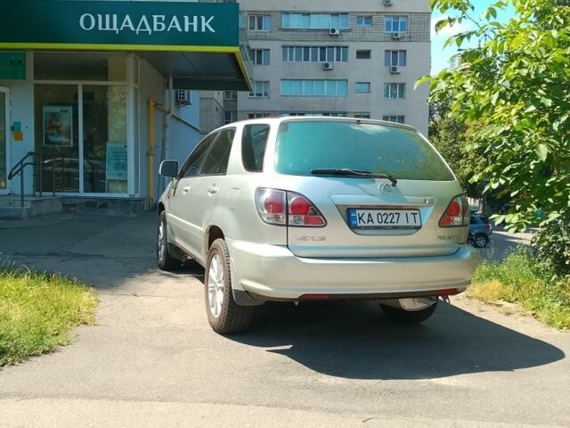 Серый Лексус РХ, объемом двигателя 3 л и пробегом 303 тыс. км за 5205 $, фото 2 на Automoto.ua