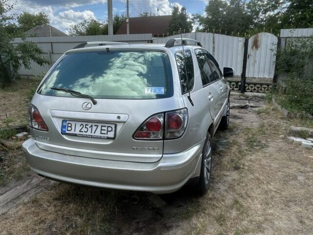 Серый Лексус РХ, объемом двигателя 3 л и пробегом 280 тыс. км за 6250 $, фото 2 на Automoto.ua