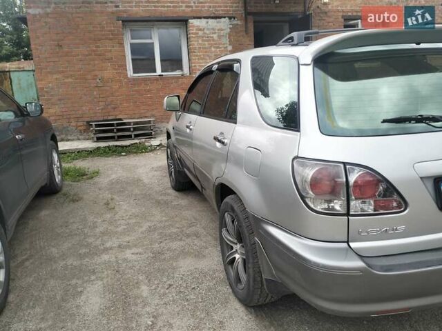 Серый Лексус РХ, объемом двигателя 3 л и пробегом 335 тыс. км за 5350 $, фото 4 на Automoto.ua