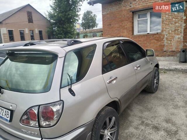 Серый Лексус РХ, объемом двигателя 3 л и пробегом 335 тыс. км за 5350 $, фото 3 на Automoto.ua