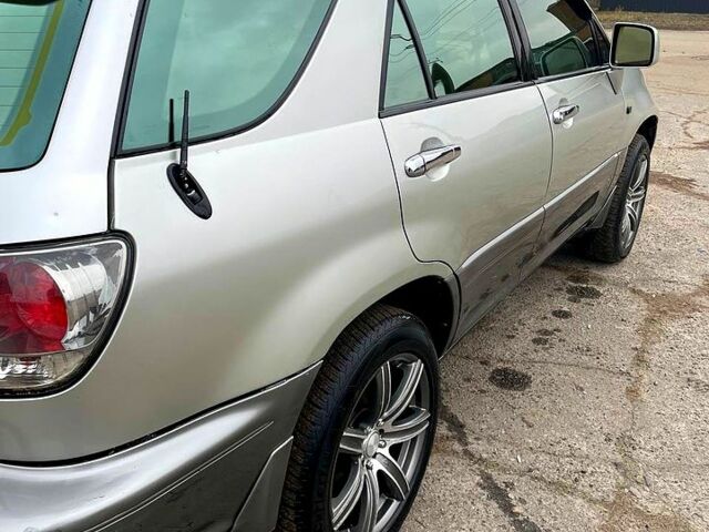 Сірий Лексус РХ, об'ємом двигуна 3 л та пробігом 344 тис. км за 5600 $, фото 3 на Automoto.ua