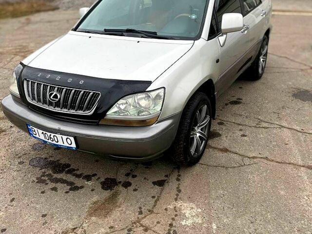 Сірий Лексус РХ, об'ємом двигуна 3 л та пробігом 344 тис. км за 5600 $, фото 1 на Automoto.ua