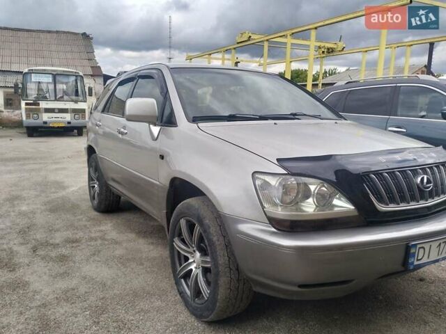 Серый Лексус РХ, объемом двигателя 3 л и пробегом 335 тыс. км за 5350 $, фото 7 на Automoto.ua