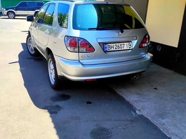 Серый Лексус РХ, объемом двигателя 3 л и пробегом 290 тыс. км за 6700 $, фото 6 на Automoto.ua