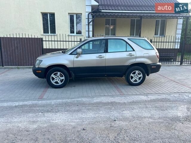 Серый Лексус РХ, объемом двигателя 3 л и пробегом 275 тыс. км за 4900 $, фото 2 на Automoto.ua
