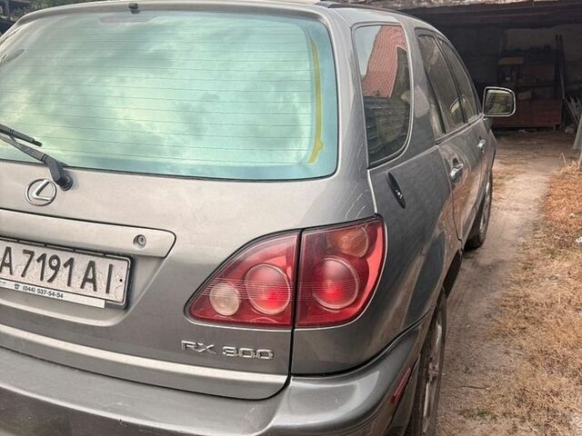 Сірий Лексус РХ, об'ємом двигуна 3 л та пробігом 294 тис. км за 3200 $, фото 1 на Automoto.ua