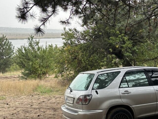 Серый Лексус РХ, объемом двигателя 3 л и пробегом 3 тыс. км за 5600 $, фото 1 на Automoto.ua