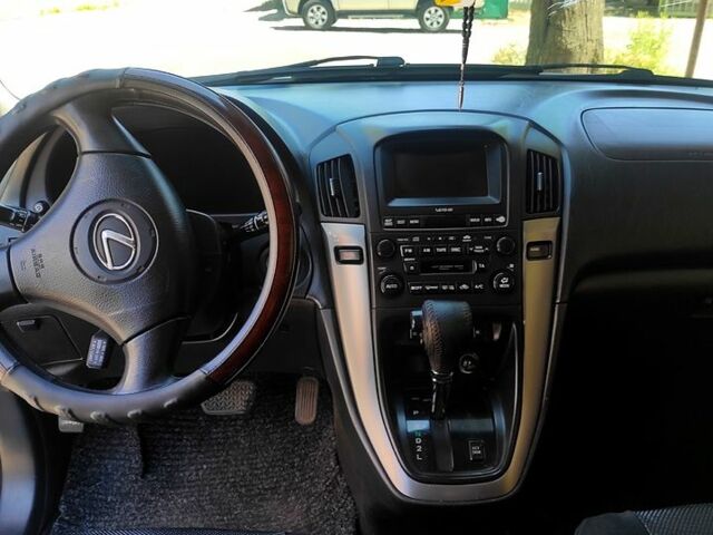 Серый Лексус РХ, объемом двигателя 3 л и пробегом 290 тыс. км за 6700 $, фото 4 на Automoto.ua