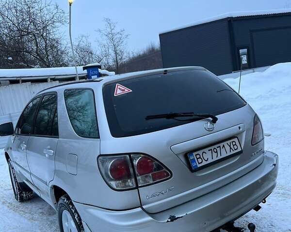 Серый Лексус РХ, объемом двигателя 3 л и пробегом 429 тыс. км за 6700 $, фото 6 на Automoto.ua