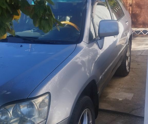 Сірий Лексус РХ, об'ємом двигуна 3 л та пробігом 245 тис. км за 5700 $, фото 5 на Automoto.ua