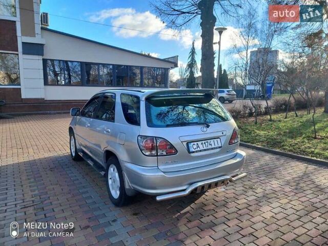 Серый Лексус РХ, объемом двигателя 3 л и пробегом 321 тыс. км за 8500 $, фото 17 на Automoto.ua