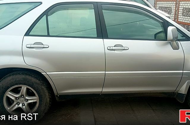 Сірий Лексус РХ, об'ємом двигуна 3 л та пробігом 250 тис. км за 5899 $, фото 2 на Automoto.ua