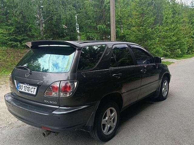 Сірий Лексус РХ, об'ємом двигуна 3 л та пробігом 399 тис. км за 5600 $, фото 3 на Automoto.ua