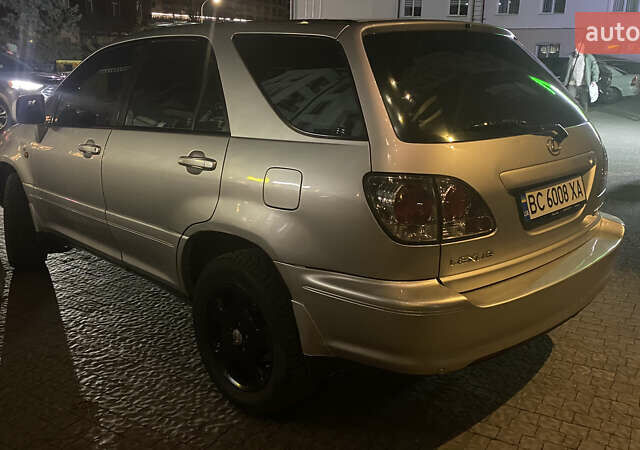 Серый Лексус РХ, объемом двигателя 3 л и пробегом 335 тыс. км за 6499 $, фото 3 на Automoto.ua