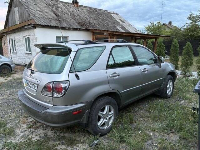 Серый Лексус РХ, объемом двигателя 3 л и пробегом 178 тыс. км за 4628 $, фото 2 на Automoto.ua
