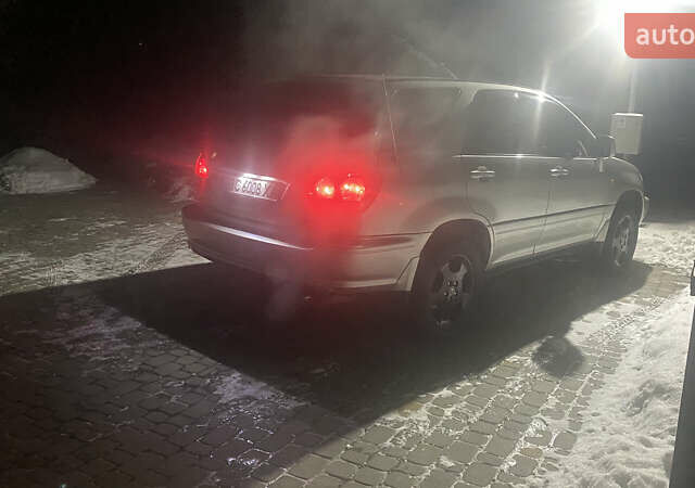 Серый Лексус РХ, объемом двигателя 3 л и пробегом 335 тыс. км за 6499 $, фото 1 на Automoto.ua