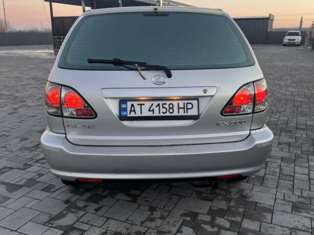 Сірий Лексус РХ, об'ємом двигуна 3 л та пробігом 340 тис. км за 6100 $, фото 2 на Automoto.ua