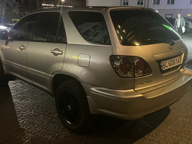 Серый Лексус РХ, объемом двигателя 3 л и пробегом 332 тыс. км за 6550 $, фото 2 на Automoto.ua