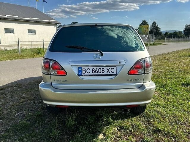 Сірий Лексус РХ, об'ємом двигуна 3 л та пробігом 339 тис. км за 6900 $, фото 67 на Automoto.ua