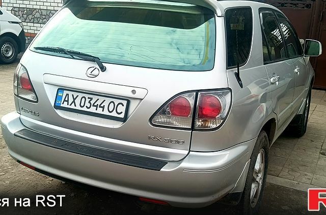 Сірий Лексус РХ, об'ємом двигуна 3 л та пробігом 250 тис. км за 5899 $, фото 3 на Automoto.ua