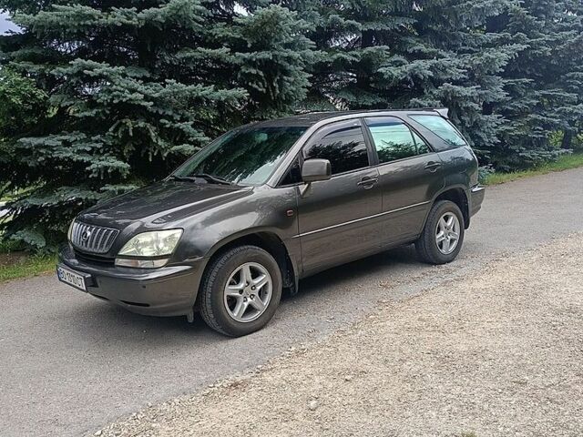 Сірий Лексус РХ, об'ємом двигуна 3 л та пробігом 399 тис. км за 5600 $, фото 1 на Automoto.ua