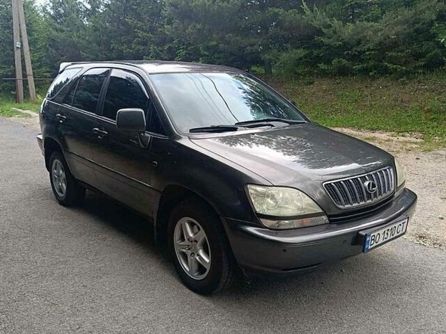 Сірий Лексус РХ, об'ємом двигуна 3 л та пробігом 399 тис. км за 6450 $, фото 1 на Automoto.ua