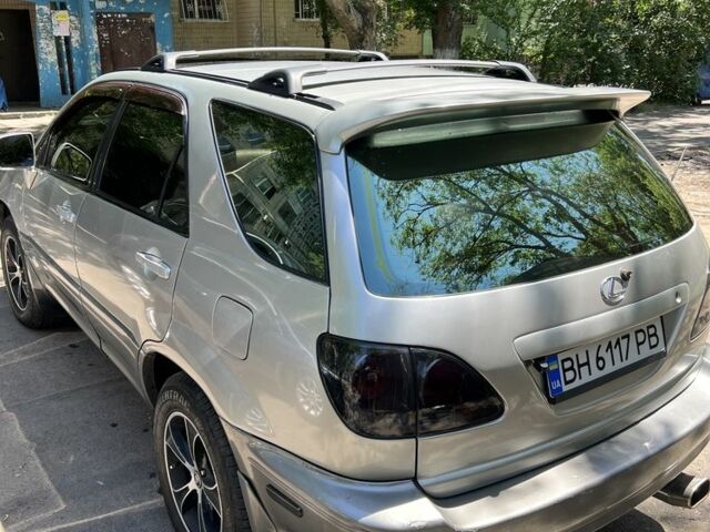 Сірий Лексус РХ, об'ємом двигуна 3 л та пробігом 3 тис. км за 7500 $, фото 4 на Automoto.ua