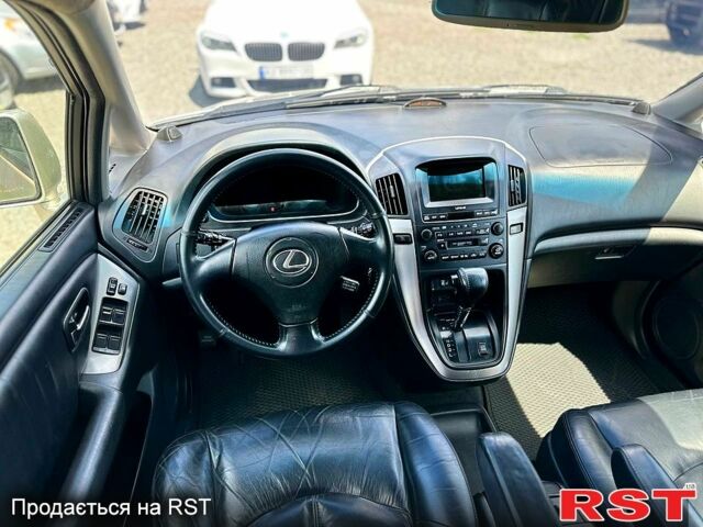 Серый Лексус РХ, объемом двигателя 3 л и пробегом 290 тыс. км за 5999 $, фото 4 на Automoto.ua
