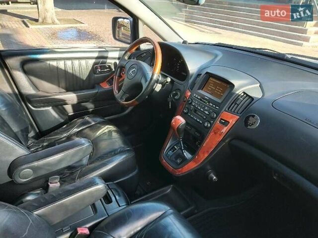 Серый Лексус РХ, объемом двигателя 3 л и пробегом 321 тыс. км за 8500 $, фото 3 на Automoto.ua