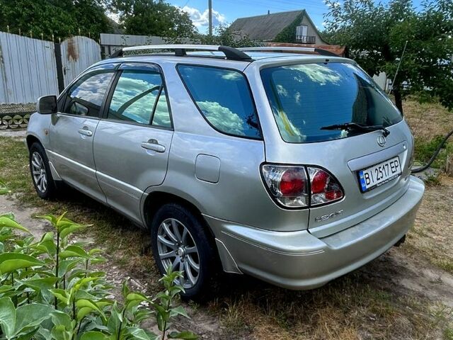 Сірий Лексус РХ, об'ємом двигуна 3 л та пробігом 280 тис. км за 6250 $, фото 2 на Automoto.ua