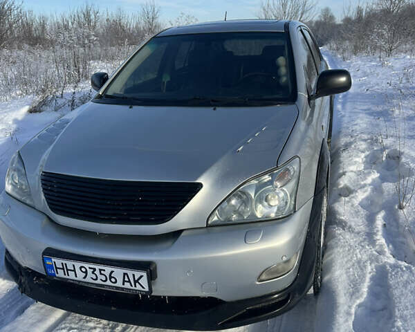 Серый Лексус РХ, объемом двигателя 3 л и пробегом 320 тыс. км за 9500 $, фото 1 на Automoto.ua
