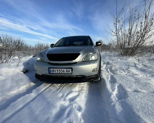 Серый Лексус РХ, объемом двигателя 3 л и пробегом 320 тыс. км за 9500 $, фото 3 на Automoto.ua