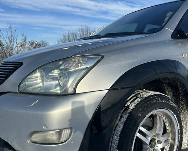 Серый Лексус РХ, объемом двигателя 3 л и пробегом 320 тыс. км за 9500 $, фото 5 на Automoto.ua