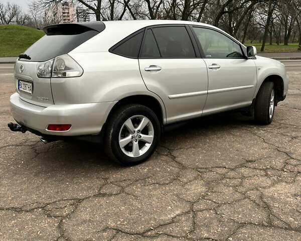 Серый Лексус РХ, объемом двигателя 3 л и пробегом 234 тыс. км за 8600 $, фото 2 на Automoto.ua