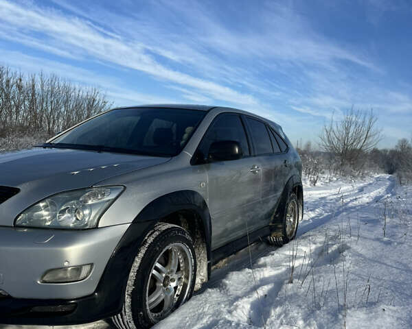 Серый Лексус РХ, объемом двигателя 3 л и пробегом 320 тыс. км за 9500 $, фото 4 на Automoto.ua