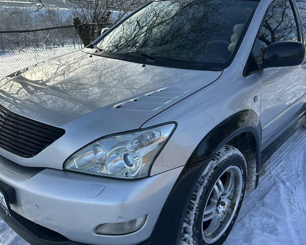 Серый Лексус РХ, объемом двигателя 3 л и пробегом 320 тыс. км за 9500 $, фото 26 на Automoto.ua