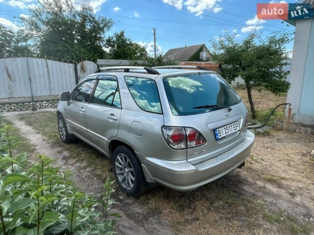 Сірий Лексус РХ, об'ємом двигуна 3 л та пробігом 280 тис. км за 6250 $, фото 3 на Automoto.ua