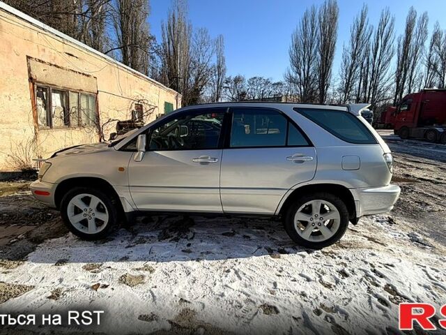 Серый Лексус РХ, объемом двигателя 3 л и пробегом 315 тыс. км за 5800 $, фото 1 на Automoto.ua