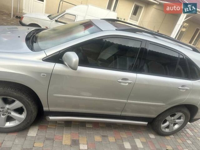 Серый Лексус РХ, объемом двигателя 3.3 л и пробегом 230 тыс. км за 10500 $, фото 1 на Automoto.ua