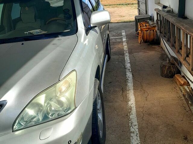 Серый Лексус РХ, объемом двигателя 3.3 л и пробегом 230 тыс. км за 10500 $, фото 1 на Automoto.ua