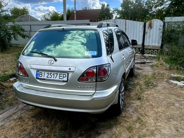 Сірий Лексус РХ, об'ємом двигуна 3 л та пробігом 280 тис. км за 6250 $, фото 1 на Automoto.ua