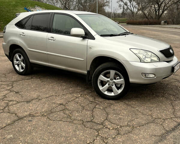 Серый Лексус РХ, объемом двигателя 3 л и пробегом 234 тыс. км за 8600 $, фото 1 на Automoto.ua