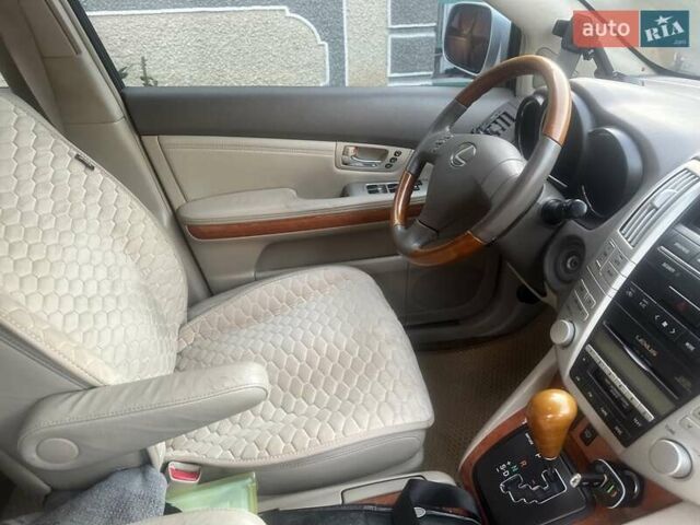 Серый Лексус РХ, объемом двигателя 3.3 л и пробегом 230 тыс. км за 10500 $, фото 2 на Automoto.ua