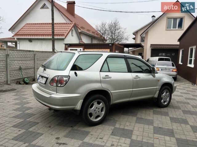 Сірий Лексус РХ, об'ємом двигуна 3 л та пробігом 242 тис. км за 11000 $, фото 22 на Automoto.ua