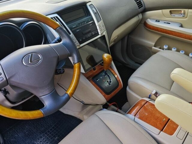 Сірий Лексус РХ, об'ємом двигуна 3.3 л та пробігом 305 тис. км за 8600 $, фото 4 на Automoto.ua