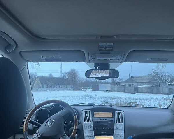 Серый Лексус РХ, объемом двигателя 3.3 л и пробегом 240 тыс. км за 7400 $, фото 7 на Automoto.ua