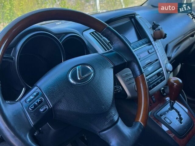 Серый Лексус РХ, объемом двигателя 3 л и пробегом 257 тыс. км за 7999 $, фото 2 на Automoto.ua
